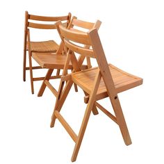 three wooden folding chairs sitting next to each other