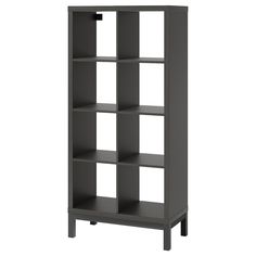 a gray bookcase with four shelves on each side