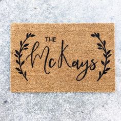 a door mat with the words, the mekays on it in black ink