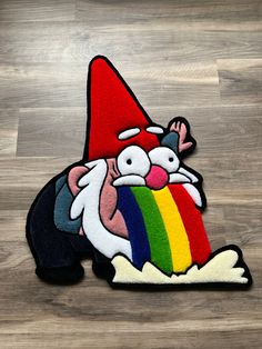 a rug with an image of a gnome holding a rainbow on it's back