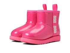 UGG Kids Classic Clear Mini II (Toddler/Little Kid/Big Kid) - Girls Shoes : Taffy Pink : Warm on the inside and waterproof on the outside, the UGG Kids Classic Clear Mini II rain boots give you the best of both worlds. Updating the iconic original, this new waterproof boot delivers fashion, function, and feel. Translucent waterproof TPU molded upper enclosing curly faux shearling, signature UGGpure wool lining, and a removable UGGpure insole. Lightweight and weather-rated to temperatures as low Casual Pink Boots For Rainy Weather, Pink Rain Boots For Winter Outdoor Activities, Casual Pink Waterproof Boots, Casual Pink Rain Boots For Winter, Pink Rain Boots For Winter Outdoor Use, Pink Weatherproof Winter Boots, Casual Pink Weatherproof Rain Boots, Pink Casual Weatherproof Rain Boots, Pink Winter Rain Boots For Outdoor