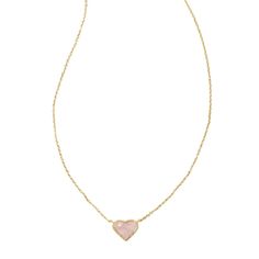 Dainty, sweet, and oh-so-chic, the Anna Pendant Necklace will have you feeling the love. An adorable heart pendant on a delicate chain, style this sweet necklace solo or stacked for a fun, flirty look. To preserve your fashion jewelry for years to come, agents such as soaps, perfumes, lotions, makeup, hair and cleaning products, and other chemical contact should be avoided. Take care to remove jewelry before showering, sleeping, exercising or swimming. Kendra Scott is known for its design and ma Feminine Heart Charm Necklace For Mother's Day, Chic Jewelry For Valentine's Day Gift, Feminine Jewelry For Valentine's Day, Feminine Heart Necklace As A Valentine's Day Gift, Feminine Heart Necklace For Valentine's Day Gift, Pink Necklace For Everyday And Valentine's Day, Delicate Pink Necklace For Valentine's Day, Feminine Heart Charm Necklaces For Valentine's Day, Delicate Charm Necklace For Valentine's Day