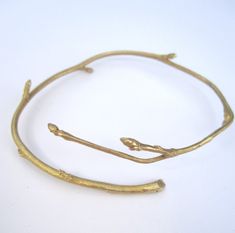 Golden brass branch bracelet is made from a real tree branch found while living in New York.  -Brushed brass for a natural feel  -Foraged from nature -solid brass construction -Gently adjustable   -inquire cost of sterling silver bracelet  My jewelry line is inspired by nature and this bracelet comes from nature.  I enjoy searching and  collecting  branches, leaves, and other organic materials to use in my jewelry collection. Twig Bracelet, Branch Bracelet, Brass Bracelet, Baby Outfit, Bracelet Argent, Flower Jewellery, Schmuck Design, Jewelry Necklace, Sterling Silver Bracelets