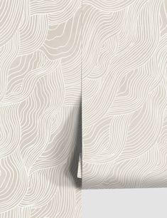 two white wallpapers with wavy lines in the middle and one on the left