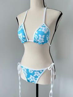 Aqua blue hibiscus bikini with adjustable straps! Full coverage bottoms Lined bottoms and cups Top has removable padding Mannequin is a size S and and is wearing a size S Swimsuits 2 Piece, Hibiscus Flower Bikinis, Cute Blue Bikinis, Hibiscus Bathing Suit, Gyaru Swimsuit, Cute Two Piece Bathing Suits, Hibiscus Clothes, Bathing Suits Outfits, Cute Bathing Suits Aesthetic