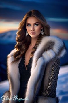 a woman wearing a fur coat and earrings in the snow at night with mountains behind her