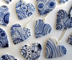 blue and white ceramic heart ornaments are displayed on an instagramtion page, with the caption above it