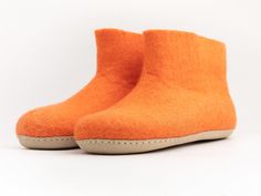 Sophisticated designs and customizable handmade orange wool boots are perfect for outside walks or at home. Mainly made from eco-friendly, lightweight, and renewable foot materials and is suitable for all ages. These wool-felt boots are ideal for catching and adapting to indoor and outdoor temperatures.  Functionally new and designed by talented and dedicated Nepali craftswomen. As a natural wool, it is the purest process to create a sustainable, non-toxic, non-allergenic and AZO-free soft felt Wool Boots, Felt Boots, Womens Booties, Booties Ankle Boots, Felted Slippers, Slipper Shoes, Slipper Boots, Natural Wool, Boot Shoes Women