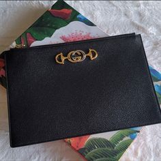 Authentic Gucci 2 Tone Clutch/ Pouch. Never Waste Time Deciding To Wear Gold Or Sliver Tone Accessories Again With This Gorgeous 2 Tone Gucci Clutch. Features Yellow And Silver Logo That Goes With Any Of Your Beautiful Outfits. Huge Trend To Add A Chain To A Clutch Or Pouch So Don’t Second Guess It And Make Any Customization That You Like. Makes An Amazing Gift This Beautiful Clutch Comes In The Shipping Box, The Designer Box Floral Print W Logo And The Beautiful Silk Floral Dust Bag With Gucci Designer Business Clutch With Gold-tone Hardware, Luxury Gucci Clutch, Chic Gucci Leather Clutch, Gucci Rectangular Clutch For Formal Occasions, Luxury Gucci Rectangular Clutch, Designer Gucci Clutch For Evening Events, Gucci Formal Rectangular Clutch, Elegant Gucci Leather Clutch, Gucci Chic Evening Clutch