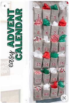 an ad for the holiday calendar hanging on a wall with stockings and socks in it