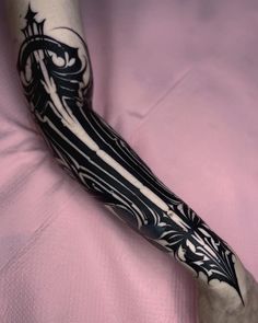 a person with a tattoo on their arm