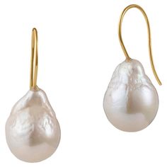 Our Baroque Drop Earrings are a best seller in our collection. This pair of earrings features baroque, drop shape pearls and a slim 18K Yellow Gold hook design that slips on to the ear. They are easy to slip on and comfortable to wear all day long without being too heavy. The long hook ensures that they stay safely on the ear. We hand pick every pair of pearls we use and ensure that the lustre is excellent. Due to the organic nature of the pearls every pair we create is unique and has a ‘one of Drop Pearl Earrings, Gold Baroque, Baroque Pearl Earrings, Pearl And Diamond Earrings, Vintage Pearls, Stunning Earrings, Modern Earrings, Diamond Drop Earrings, Gold Drop Earrings