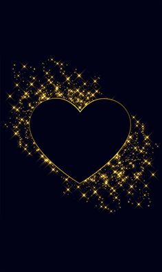 a golden heart with sparkles on a black background