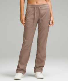 Easy, comfortable, and never clingy, these pants are in our after-practice hall of fame. Designed for Casual. Classic fit is an easy fit that floats away from your body:31.5" inseam, intended to sit below the ankle for heights of 5'5"-5'8". Waistband drawcord helps you customize the fit. Hand pockets with hidden pocket for small items. Hem drawcords let you adjust your look. Dance Studio Pants, Studio Pants, Quick Getaway, Lululemon Pants, Lightweight Pants, Dance Studio, Lululemon Women, Athletic Pants, The Dance