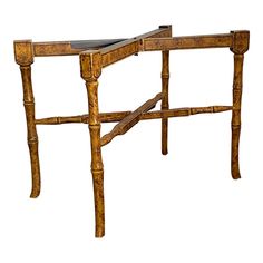 an old wooden table with two legs and a tray on it's top, against a white background