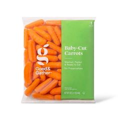 baby - cut carrots in a bag on a white background