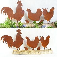 a group of metal roosters standing next to each other