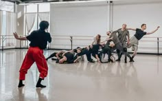 a group of dancers in a dance studio