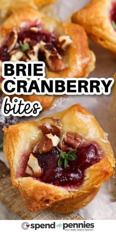 some cranberry bites are sitting on top of a wooden board with the words, brie cranberry bites