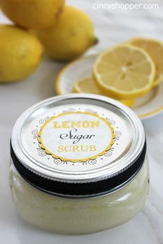 lemon sugar scrub on a plate with lemons in the background