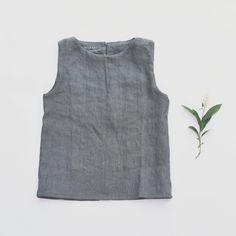 * 100% soft linen * Sleeveless * 2 buttons at the back * Handmade in Slovakia Sleeveless Linen Summer Vest, Everyday Linen Sleeveless Tank Top, Everyday Sleeveless Linen Tank Top, Casual Sleeveless Flax Tank Top, Sleeveless Linen Top For Everyday, Everyday Sleeveless Linen Top, Sleeveless Flax Tops For Spring, Everyday Linen Tank Top, Spring Sleeveless Flax Tops