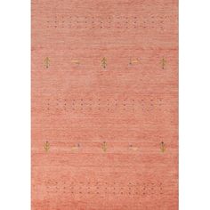 an orange rug with small dots on it