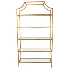 a gold metal shelf with glass shelves