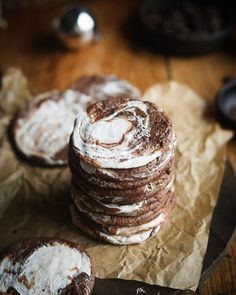 a stack of cookies sitting on top of a wooden table