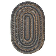 the oval rug is made from braiding and has blue, brown and tan colors