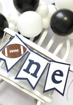 a football themed birthday party with black and white balloons