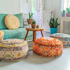 a living room filled with lots of colorful furniture