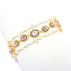 Make an elegant, eye-catching statement on your wrist with this Cameo Italiano "Anastasia" flower bracelet. Showcasing 11 carved shell cameos, it also has 24 freshwater cultured pearls. It's finely crafted in 18K yellow gold plated sterling silver with a polished finish that provides across-the-room gleam. Measuring 8.75", it has a 1.25" extender with three toggle rings to ensure it perfectly suits your style. You'll love showing this piece off! It's the perfect finishing touch to any ensemble. Cultured Pearl Bracelet, Pearl Farm, Freshwater Cultured Pearls, Carved Shell, Flower Bracelet, Baroque Pearls, Cultured Pearls, Gold Plated Sterling Silver, Jewelry Plate