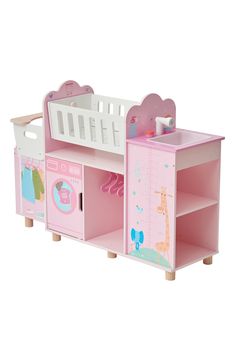 a pink toy crib with drawers and shelves