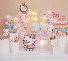 a hello kitty themed birthday party with balloons