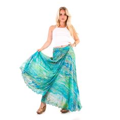 Be unique | Wear art A beautiful and floaty wrap skirt, perfect for both days and nights, with high heels, flat sandals or trainers. Made of 100% rayon - a bio-based soft and breathable fabric. Limited edition. One size, just wrap the skirt around your waist. Can fit a size 6 to 16 UK size, 38/48 EU size, 2/12 US size, 6/16 Australian size, 38/48 Italian size. Comes in five different prints. Designed in London - made with love. Breezy Maxi Skirt For Summer, Breezy Tiered Flowy Maxi Skirt, Breezy Tiered Lined Maxi Skirt, Breezy Tiered Maxi Skirt With Lining, Breezy Flowy Long Maxi Skirt, Summer Breezy Flared Maxi Skirt, Summer Maxi Dress With Relaxed Wide Leg Skirt, Beach Flowy Maxi Dress With Lined Skirt, Breezy Summer Maxi Skirt With Lined Skirt