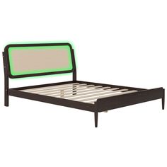 a bed with a green headboard and foot board on it's side, in front of a white background