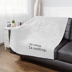 The "Go away, I'm reading." blanket is perfect for anyone who wants to snuggle up and get lost in a book! Created to be as soft as possible, this microfiber fleece blanket is made with 100% fluffy polyester. Available in 3 different sizes, these blankets are heavy-knitted with ultra-fine microfiber yarns for a luxurious feel to the touch. Reading Blanket, Tiny Library, Book Tote Bag, Nerd Gifts, Book Jokes, Heavy Knit, Bookish Gifts, Cricut Creations, Pencil Bags