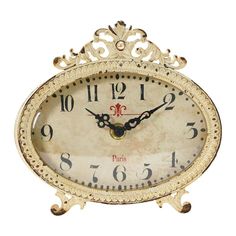 an ornate clock with roman numerals on it's face is shown against a white background