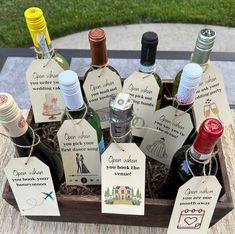 a wooden box filled with lots of bottles of wine next to tags that say you don't drink