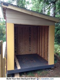 a small shed with the door open