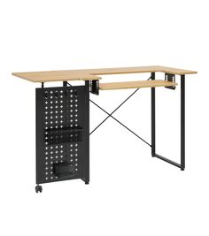 a computer desk with a wooden top and black metal frame on the bottom, against a white background