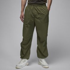 Lightweight and ready for whatever, these woven nylon pants have a water-repellent finish to help you stay dry when rain rolls in. Plus, elastic drawcords at the hem give you styling power. How will you wear 'em? Green Bottoms With Functional Drawstring For Outdoor, Green Outdoor Bottoms With Functional Drawstring, Relaxed Fit Outdoor Pants With Functional Drawstring, Casual Moisture-wicking Parachute Pants For Outdoor, Nylon Parachute Pants With Drawstring For Hiking, Outdoor Parachute Pants With Functional Drawstring, Outdoor Techwear Pants With Functional Drawstring, Sports Utility Parachute Pants With Drawstring, Sports Utility Parachute Pants With Functional Drawstring