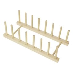 two wooden pegs are stacked on top of each other to form a rack for clothes