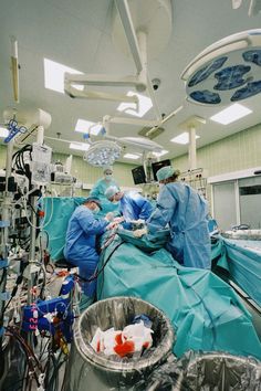 medical personnel performing surgery in an operating room