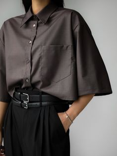 Longer length half sleeve button through shirt with large front chest pocket. High neck collar line. Model is in MINUSEY ONE SIZE. ✔️ Free worldwide express shipping over $100✔️ Loved by 6,500+ customers✔️ Limited edition collections, maximum styleStay ahead of the trend with can’t-find-anywhere-else staples. Your closet will thank you 💕 * MINUSEY ONE SIZE = EU 34-38, US 2-6* 5% Wool / 18% Rayon / 75% Tencel / 2% Spandex* Dry clean* Made in Korea - Model Height: 172cm/5'7" (US2, EU34) Tela, Female Button Up Outfits, Homecoming Outfits Gender Neutral, Mens Shirts On Women, Nonbinary Homecoming Outfit, Gender Neutral Homecoming Outfit, Fancy Gender Neutral Outfits, Brown Button Up Outfit, Classy Tomboy Outfits