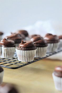 chocolate cupcakes cooling on a wire rack