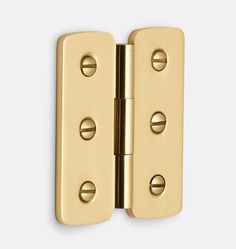 a brass plated door hinge with three holes on the front and two sides