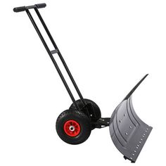 a black and red hand truck with two snow shovels on the front wheel,