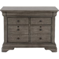 an old gray dresser with drawers