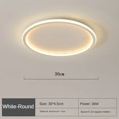 the white round light fixture is shown with measurements